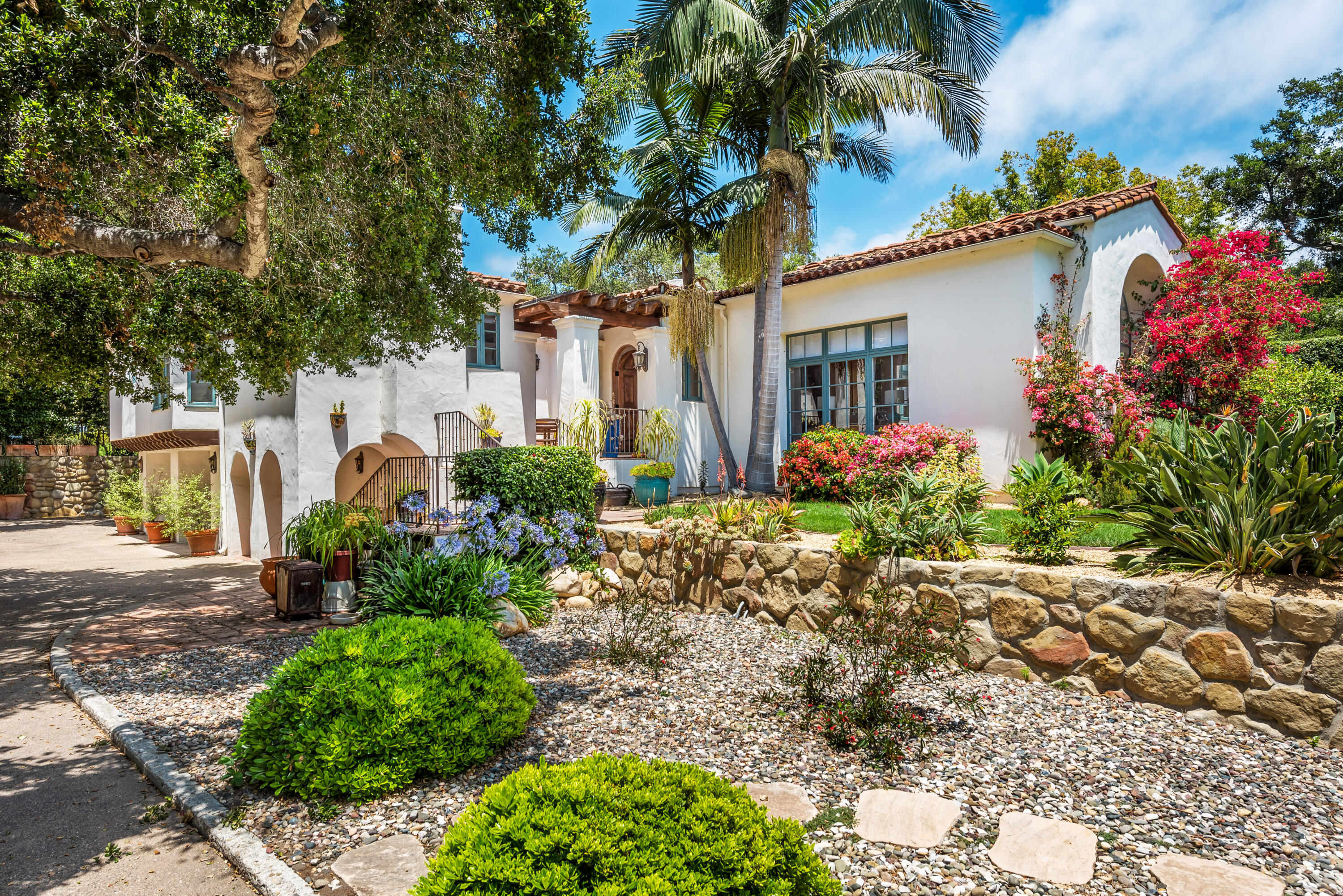 1394 School House Road Santa Barbara, CA 93108 - Photo 3 of 13 a front view of a house with garden