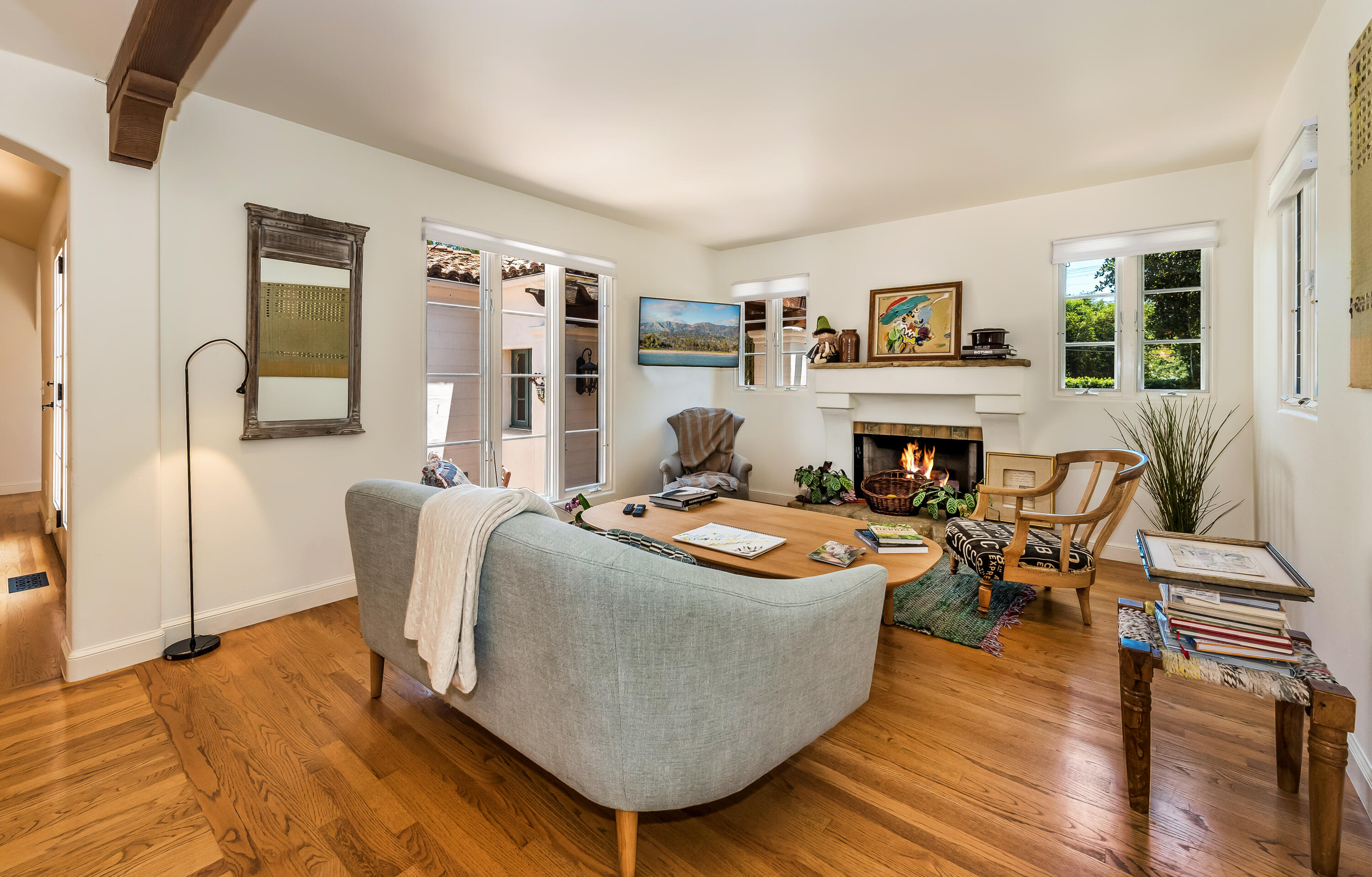 1394 School House Road Santa Barbara, CA 93108 - Photo 8 of 13 a living room with furniture and a fireplace