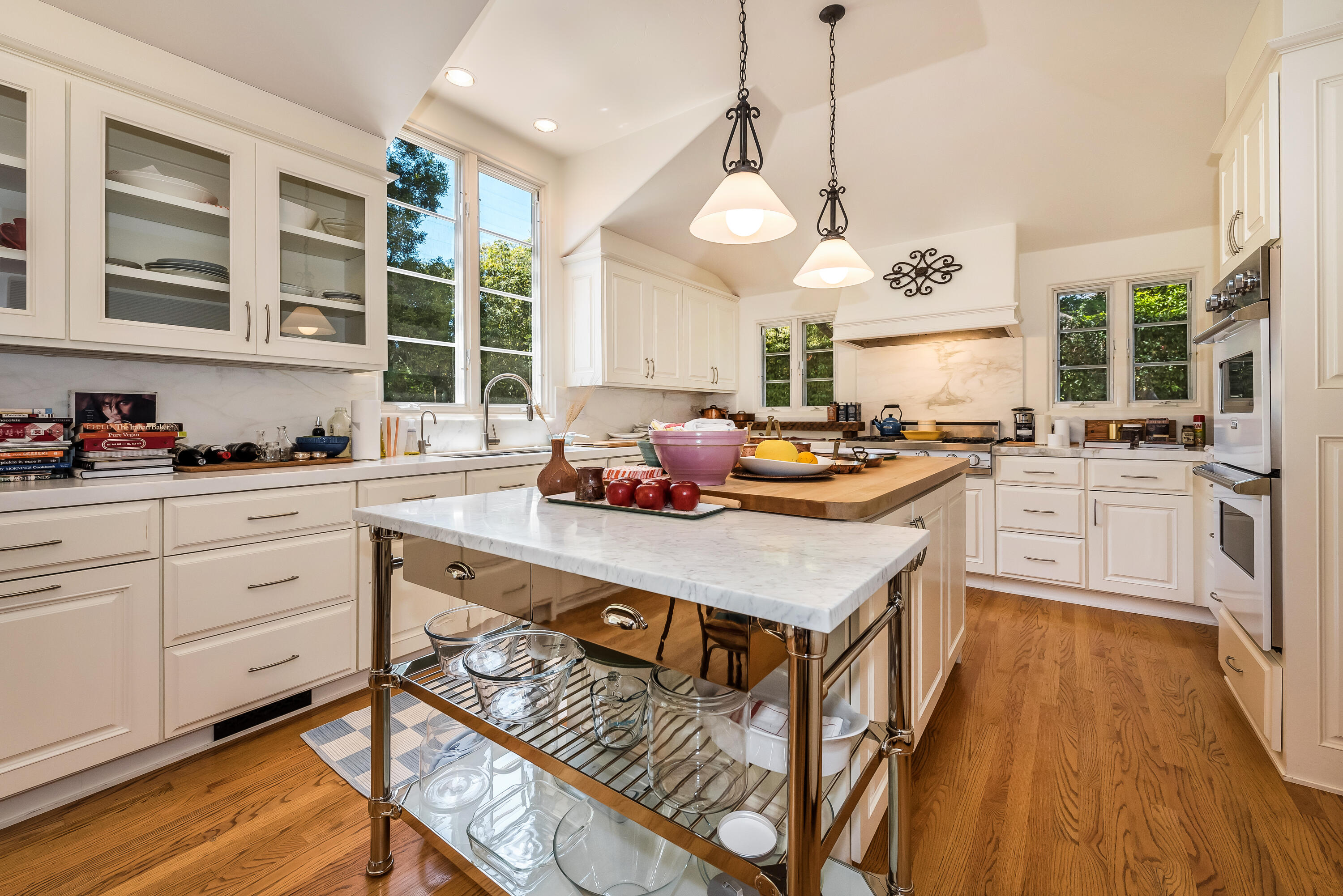 1394 School House Road Santa Barbara, CA 93108 - Photo 10 of 13 a kitchen with a stove cabinets and window