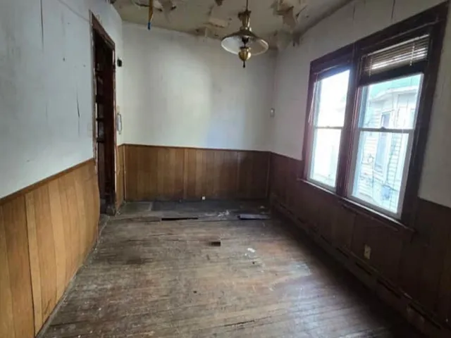 an empty room with windows