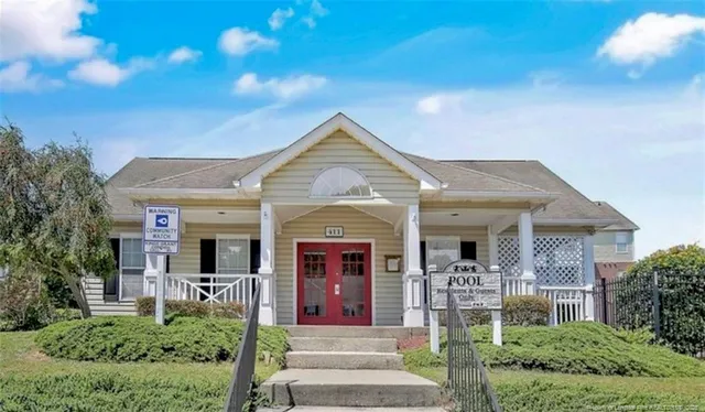 a front view of a house with a porch