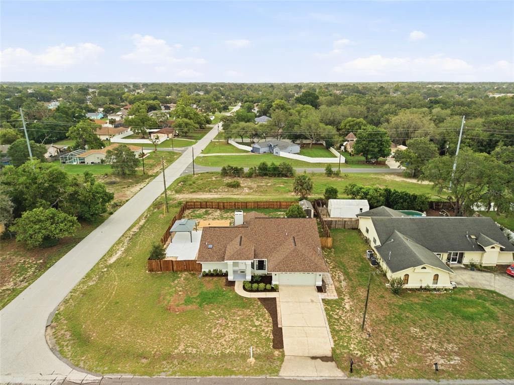 4966 Keysville Avenue Spring Hill, FL 34608 - Photo 2 of 48 a view of a swimming pool with a lake view