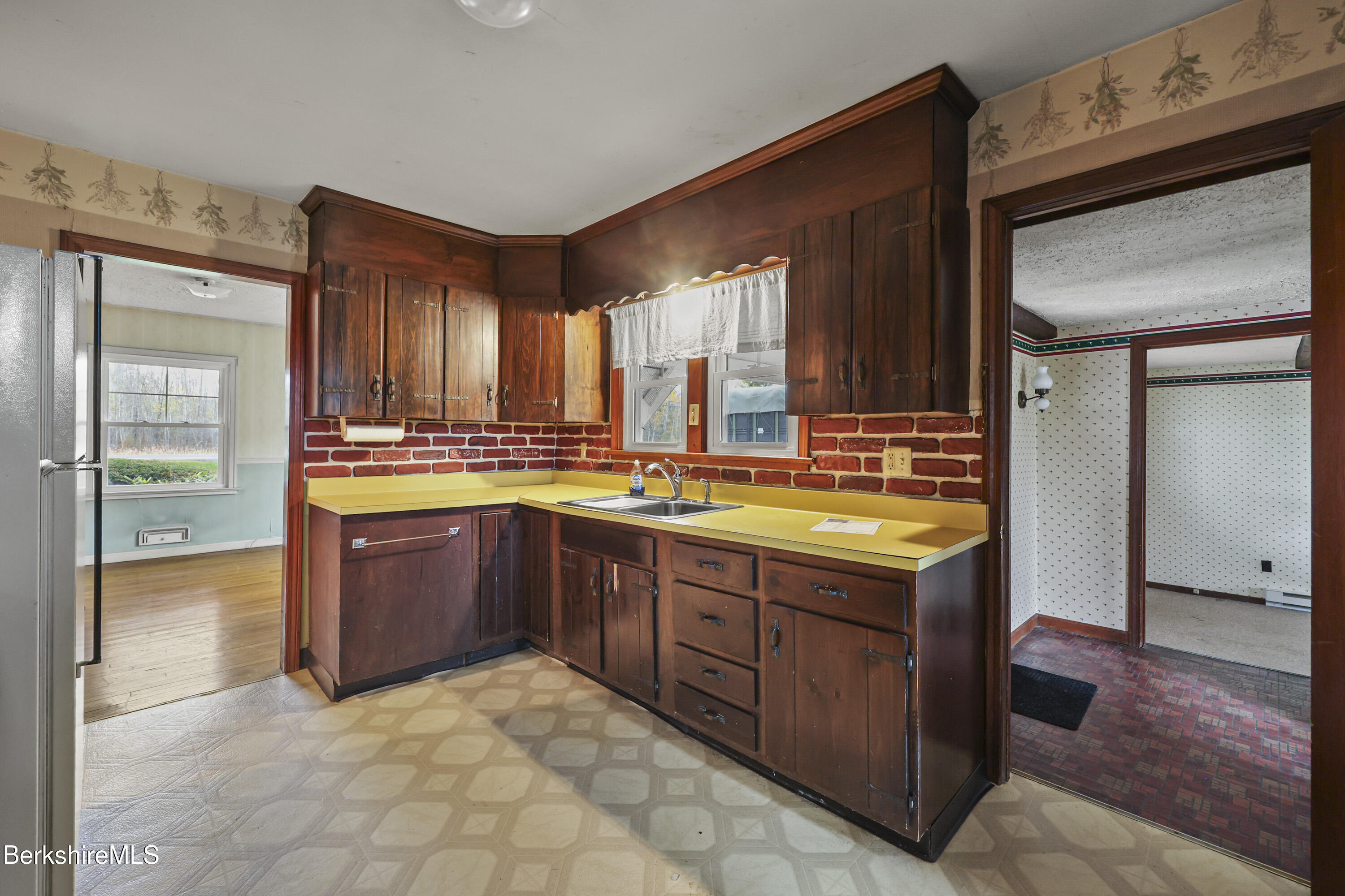 399 State Road Richmond, MA 01201 - Photo 19 of 43 a spacious bathroom with a granite countertop sink and a mirror