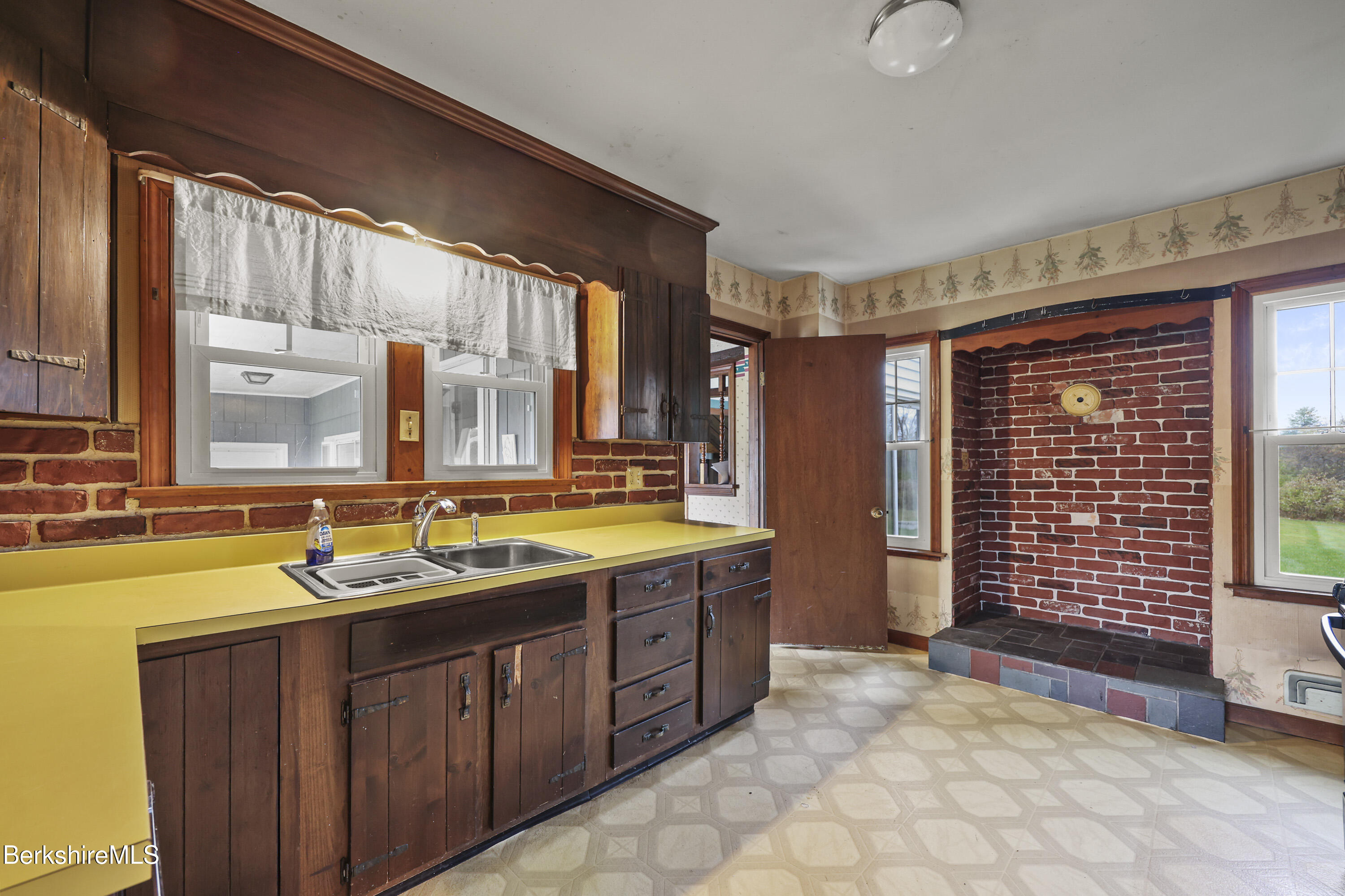 399 State Road Richmond, MA 01201 - Photo 21 of 43 a bathroom with a granite countertop sink and a bathtub