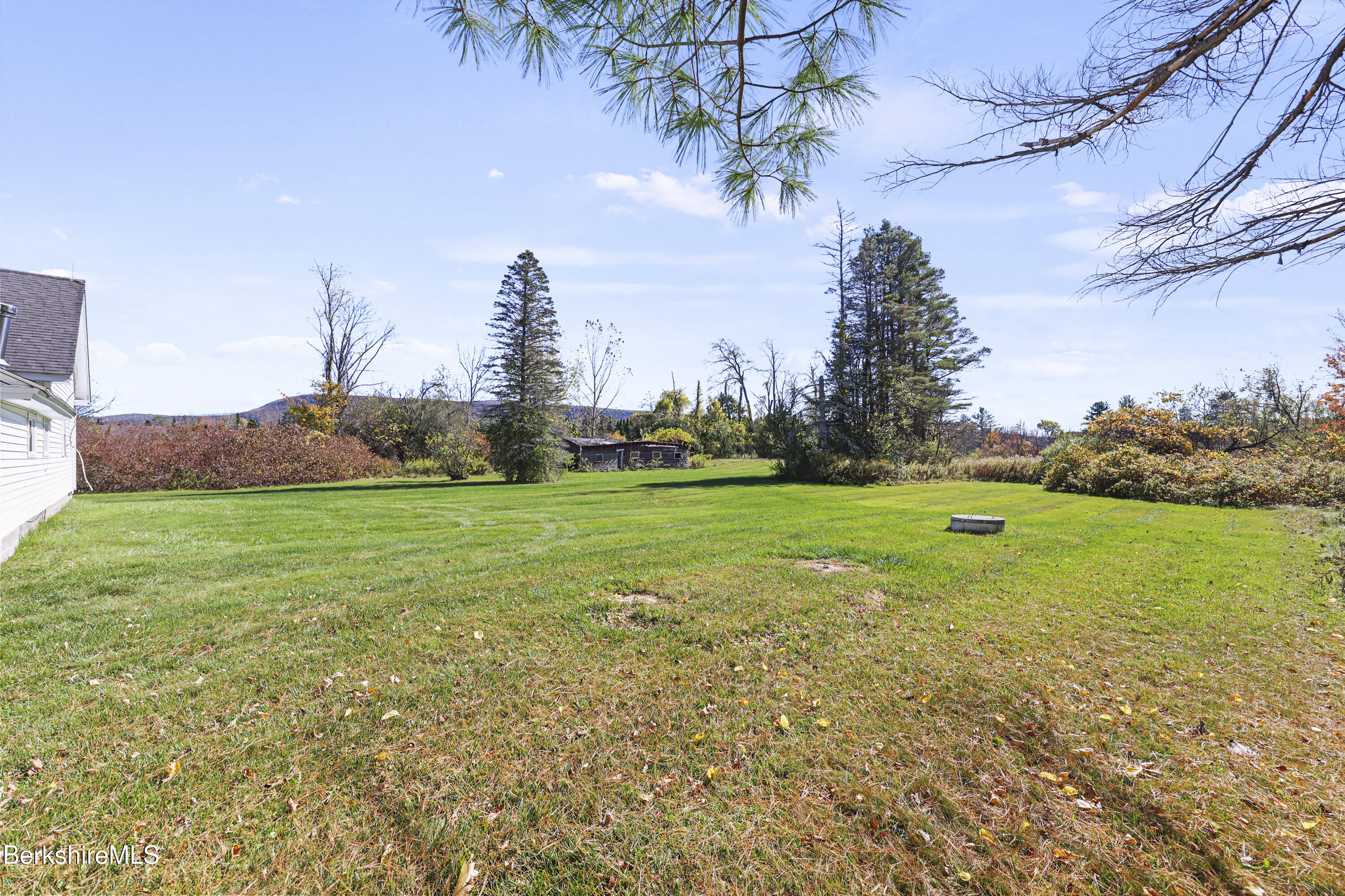 399 State Road Richmond, MA 01201 - Photo 38 of 43 a view of a green field with clear sky