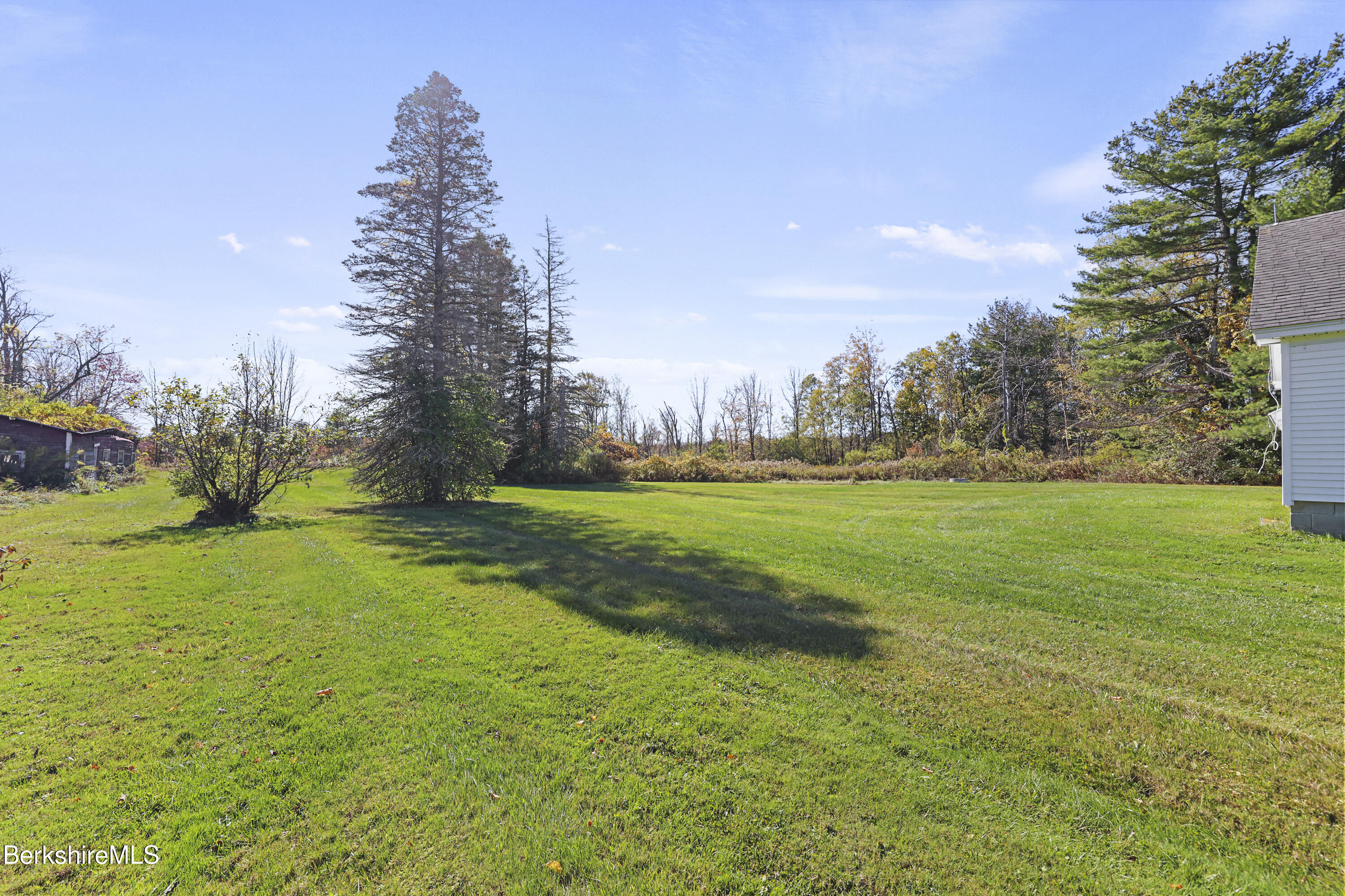 399 State Road Richmond, MA 01201 - Photo 39 of 43 a view of grassy field with trees