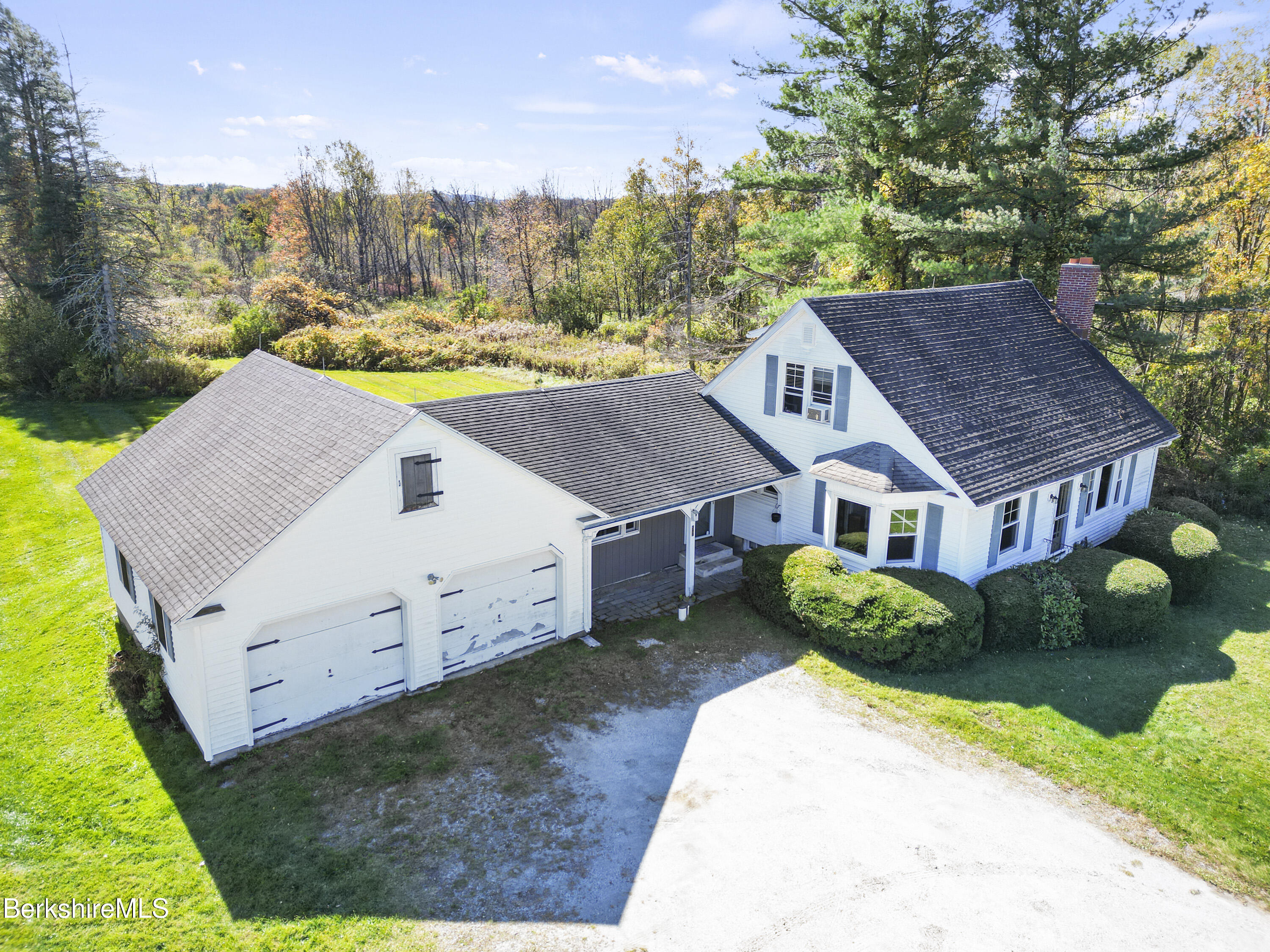 399 State Road Richmond, MA 01201 - Photo 6 of 43 a aerial view of a house next to a yard