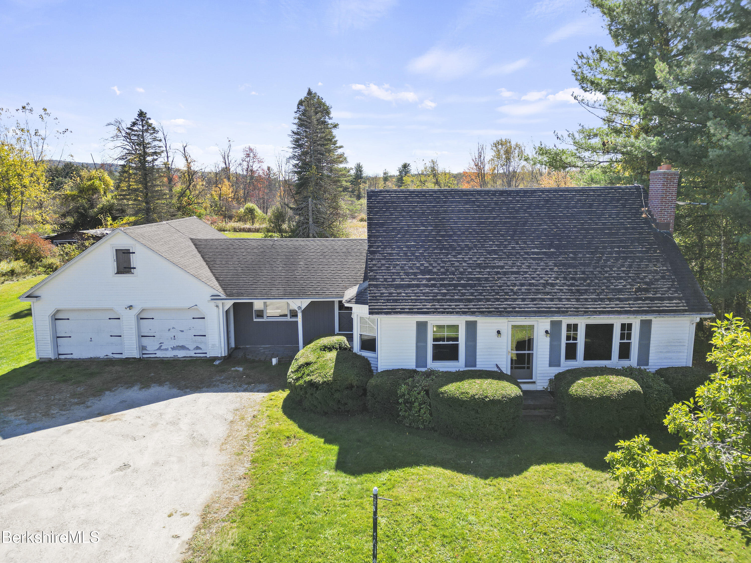 399 State Road Richmond, MA 01201 - Photo 7 of 43 a house view with a garden space