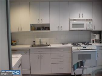 2038 Valley Road Jenkintown, PA 19046 - Photo 3 of 12 a kitchen with cabinets appliances and a sink