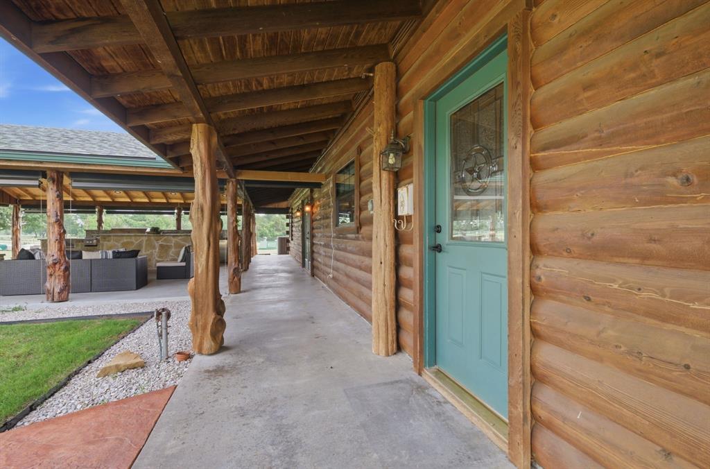 465 Emberson Ranch Road Pilot Point, TX 76258 - Photo 25 of 40 a view of a porch