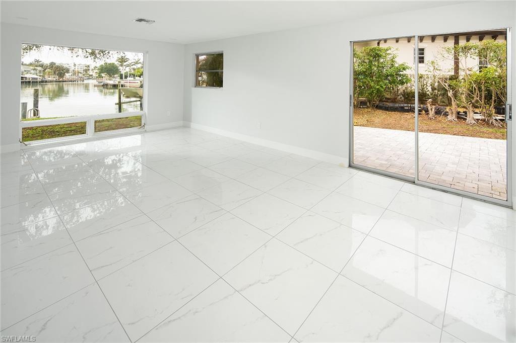 320 Bow Line Drive Naples, FL 34103 - Photo 13 of 20 a view of a room with a large window