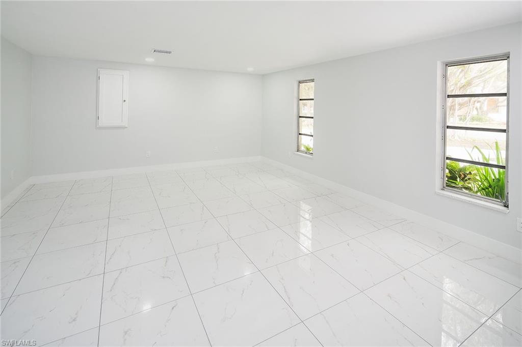 320 Bow Line Drive Naples, FL 34103 - Photo 17 of 20 an empty room with windows and closet