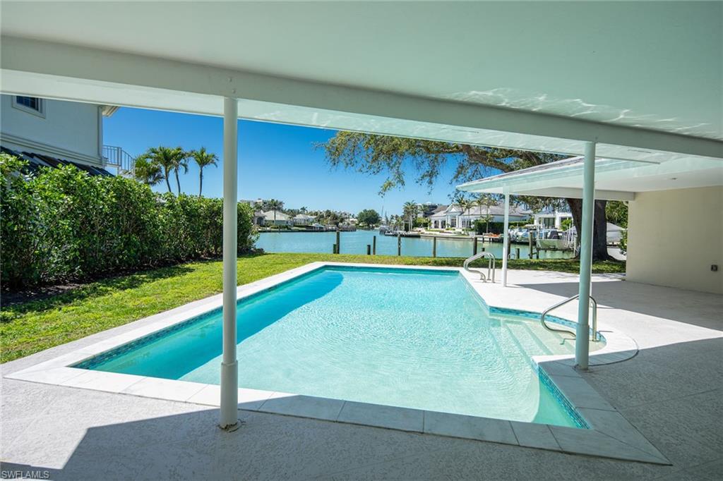 320 Bow Line Drive Naples, FL 34103 - Photo 2 of 20 a room with lots of green space