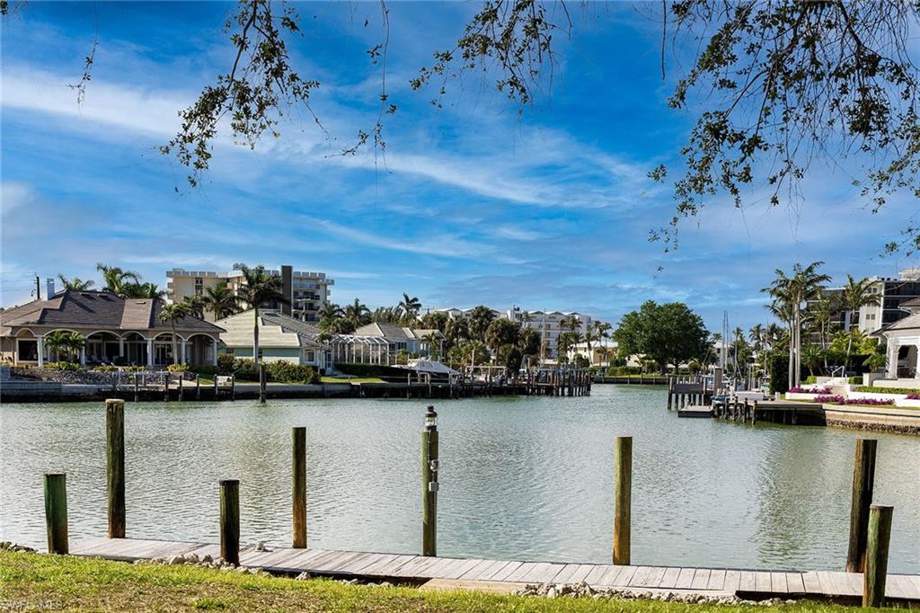 320 Bow Line Drive Naples, FL 34103 - Photo 5 of 20 a view of a lake