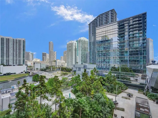 a view of a city with tall buildings