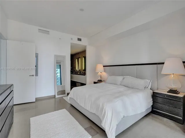 a bedroom with a bed and closet