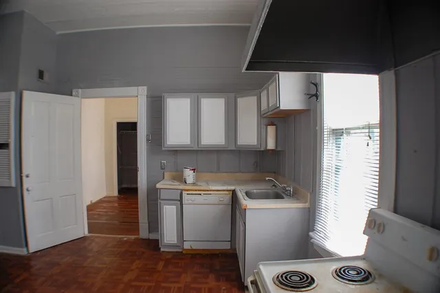 a view of outdoor space with sliding windows