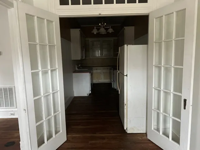 a view of entryway with wooden floor
