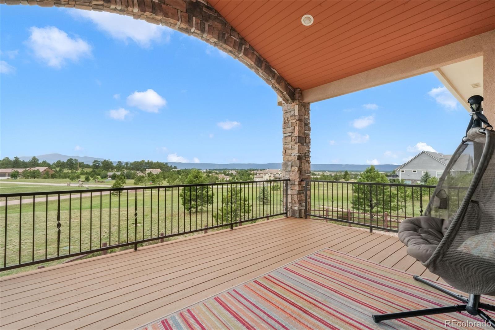 4330 Settlers Ranch Road Colorado Springs, CO 80908 - Photo 9 of 50 a view of balcony with staircase