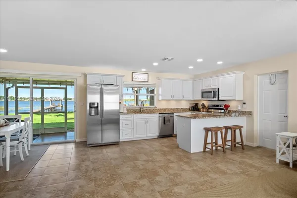 a kitchen with a sink and counter top space