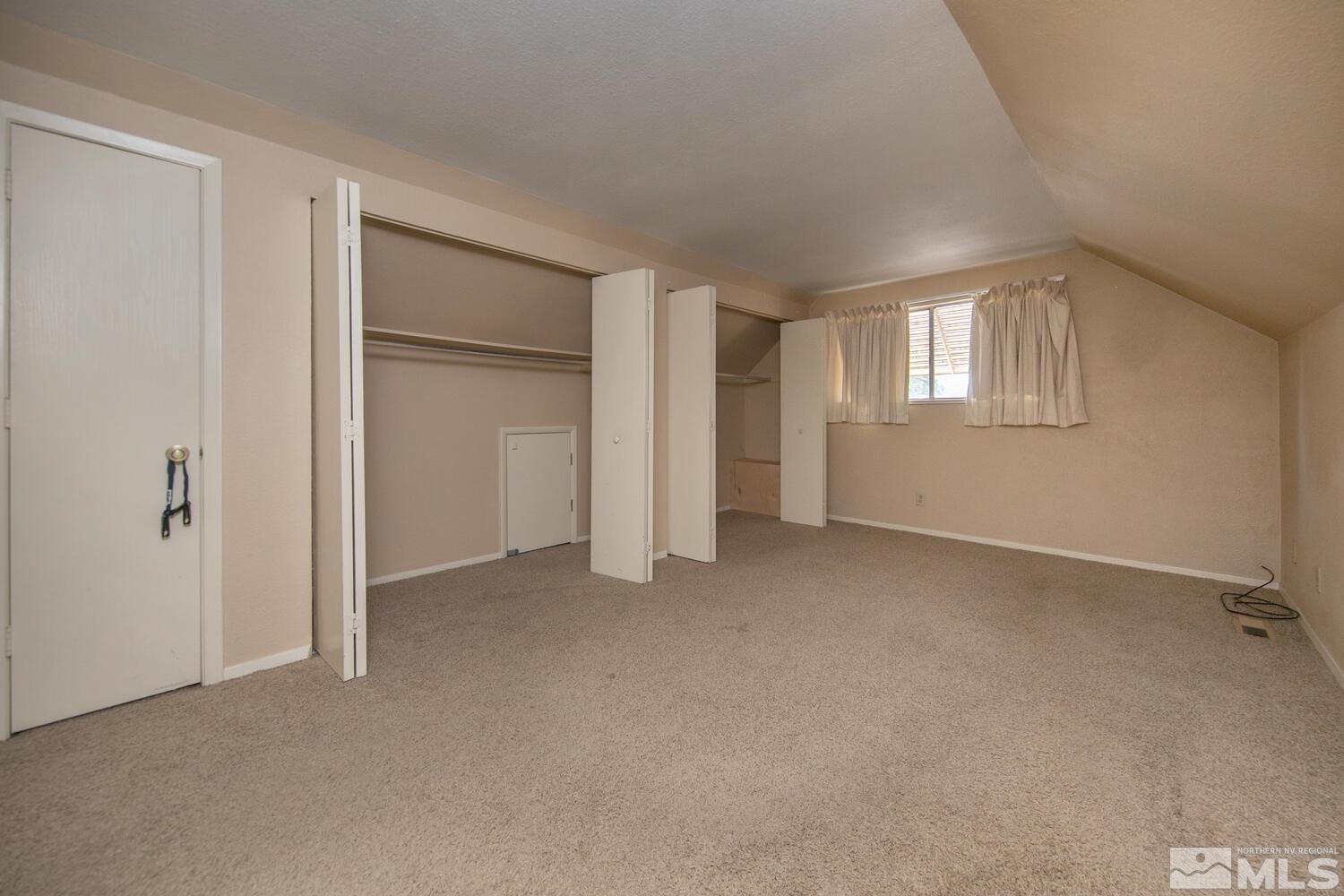 1675 Kings Row Reno, NV 89503 - Photo 15 of 32 a view of empty room with windows