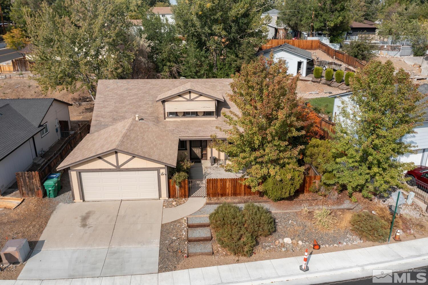 1675 Kings Row Reno, NV 89503 - Photo 2 of 32 an aerial view of a house with a yard