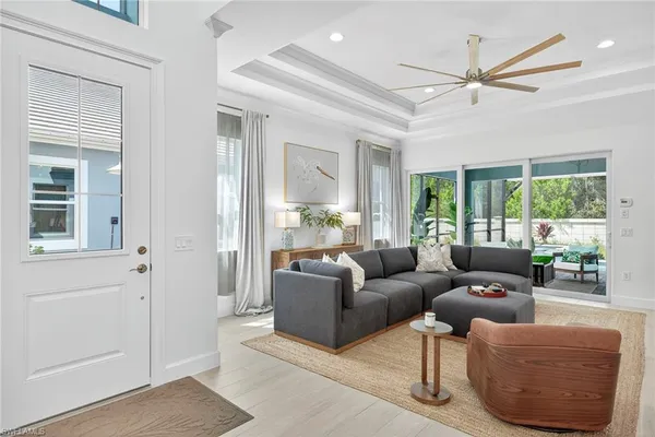 a living room with furniture and a window