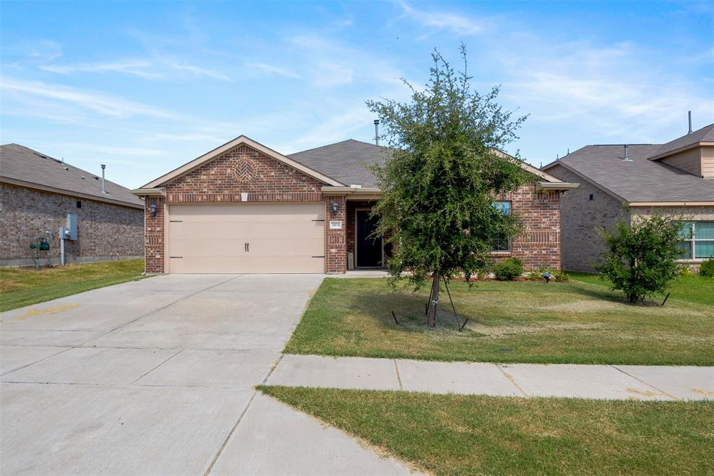 3104 Holstein Drive Forney, TX 75126 - Photo 1 of 1 a front view of a house with garden
