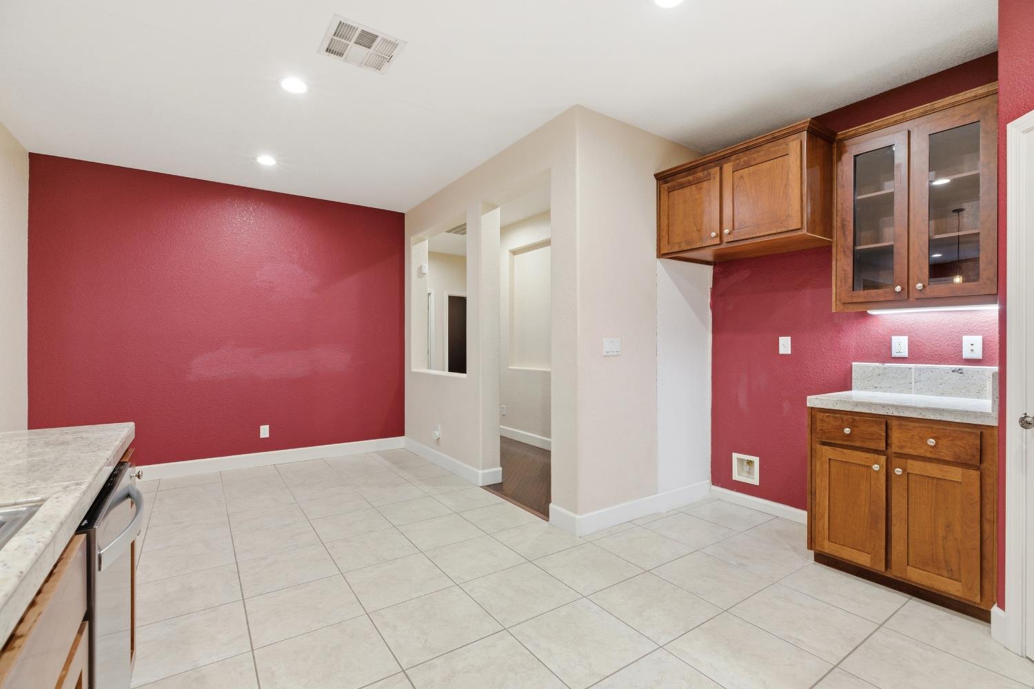 2609 Amir Drive Modesto, CA 95355 - Photo 17 of 36 a kitchen with stainless steel appliances granite countertop a refrigerator and a stove top oven