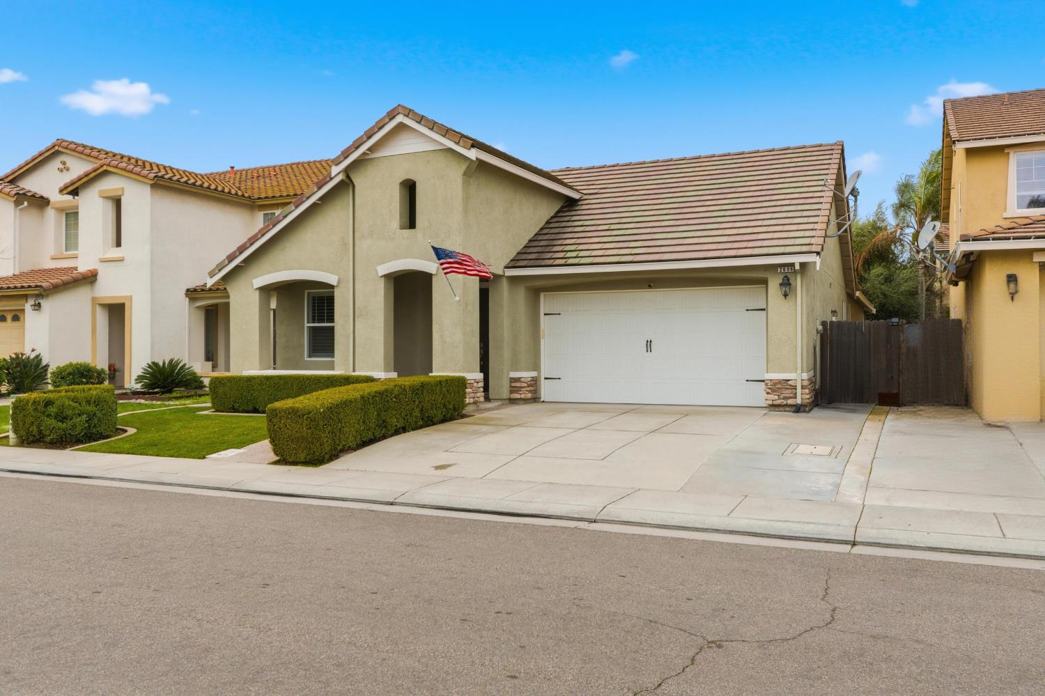2609 Amir Drive Modesto, CA 95355 - Photo 2 of 36 a view of a white house with a large windows