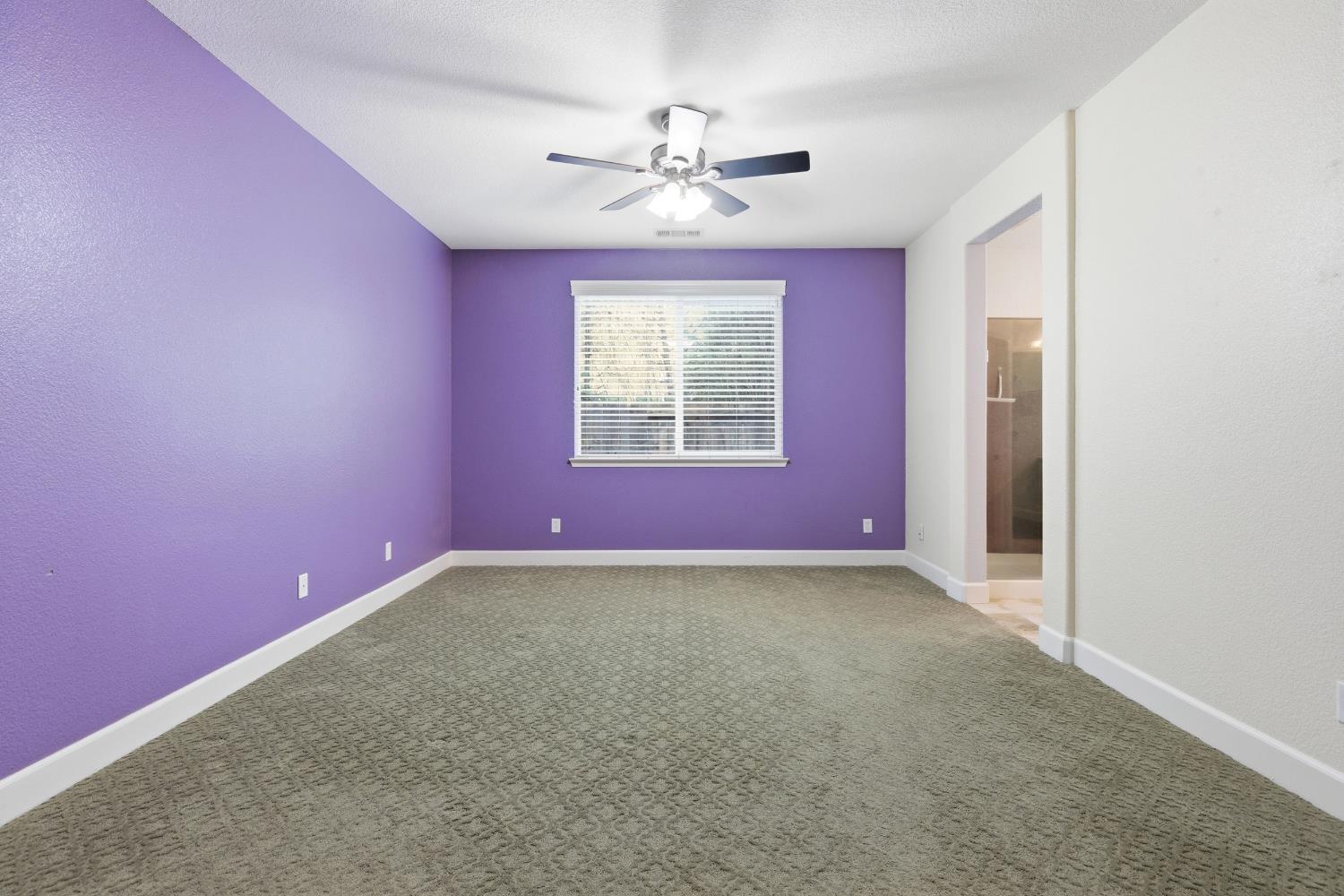 2609 Amir Drive Modesto, CA 95355 - Photo 23 of 36 en empty room with windows and ceiling fan
