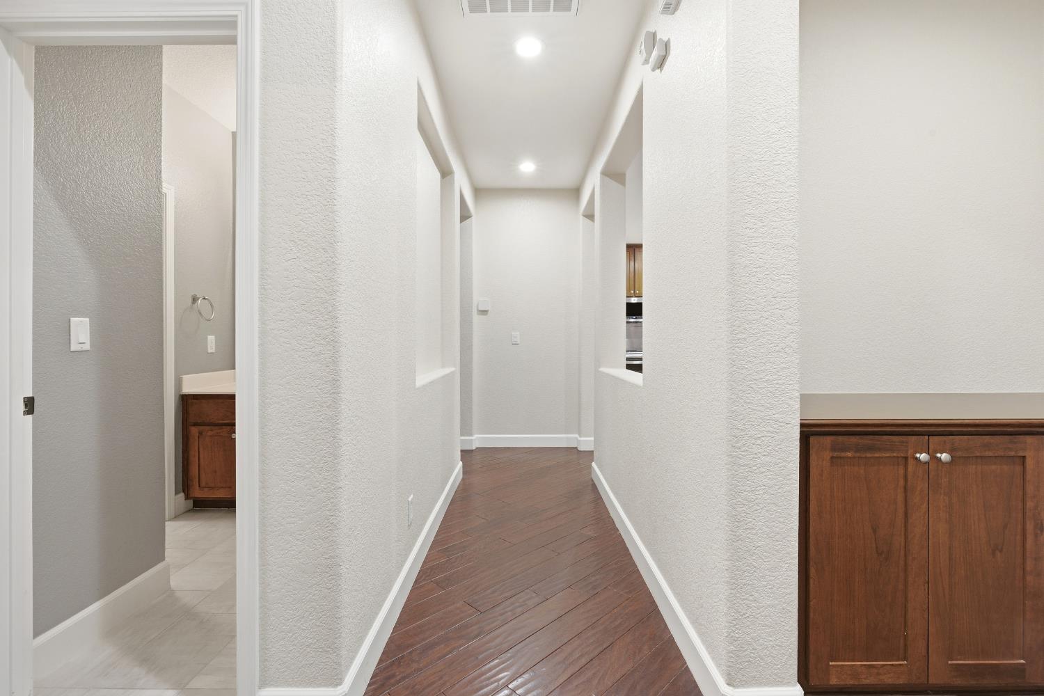 2609 Amir Drive Modesto, CA 95355 - Photo 10 of 36 a view of hallway with wooden floor