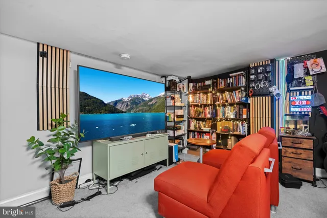a workspace with furniture and book shelf