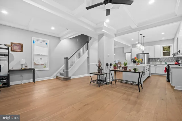 a view of a livingroom with furniture and a flat screen tv