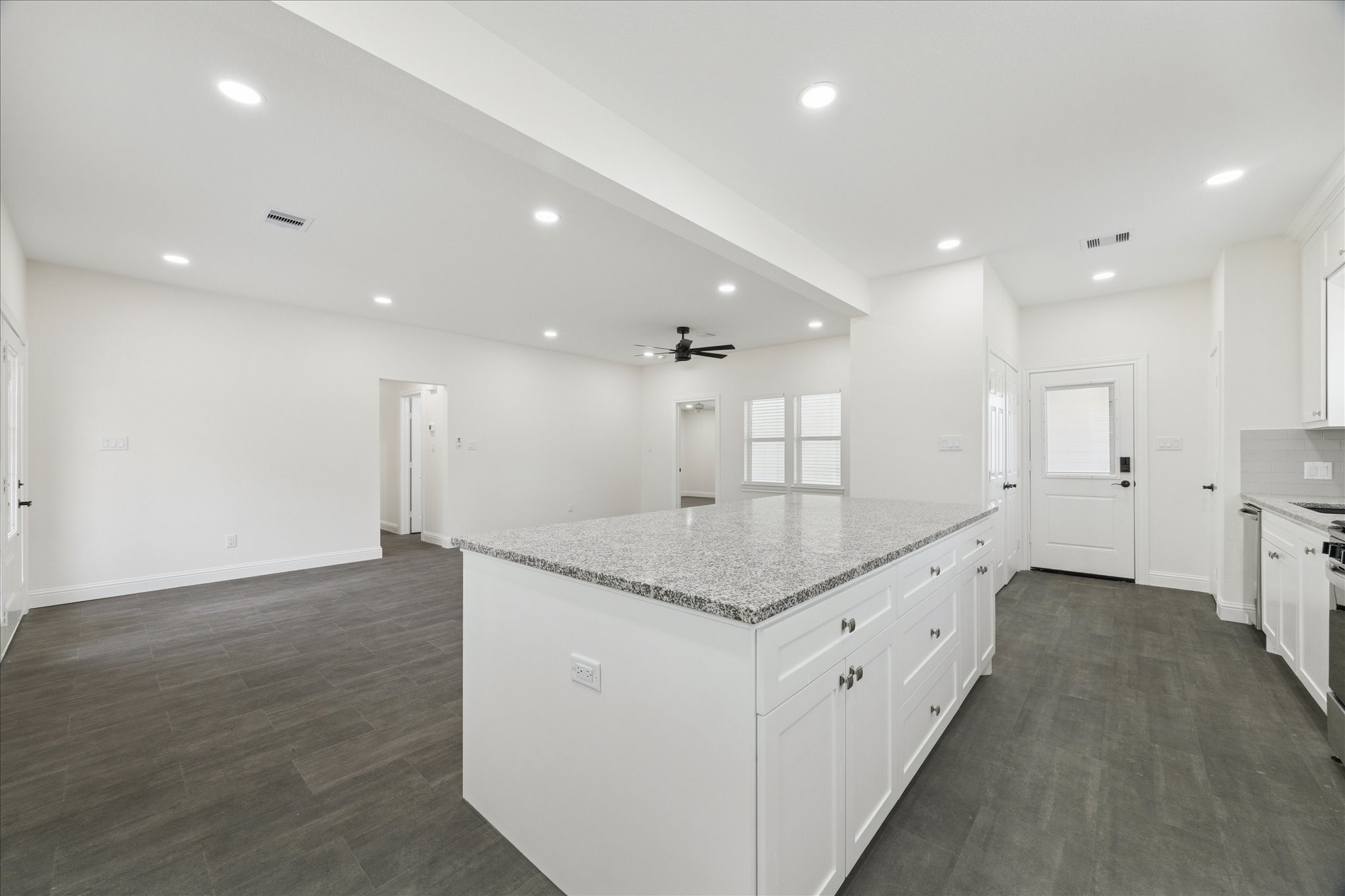 30731 Martens Road Tomball, TX 77375 - Photo 10 of 25 a bathroom with a granite countertop sink and a mirror