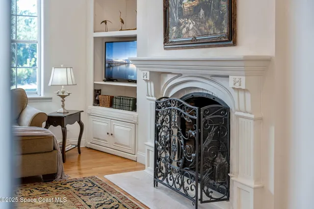 a view of livingroom with furniture and fireplace