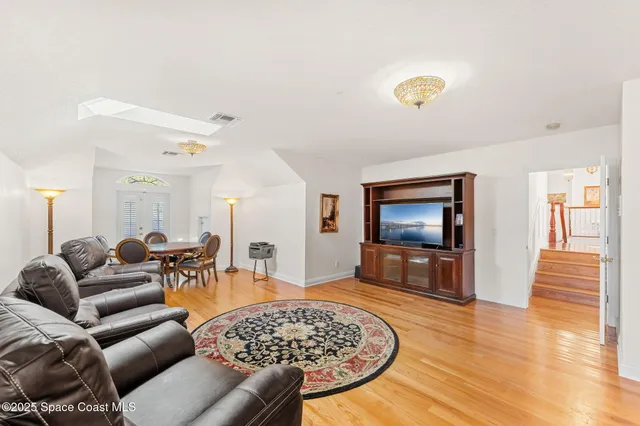 a bedroom with a bed and a desk