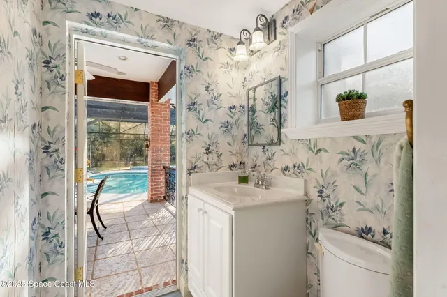 a view of a chairs and table in patio