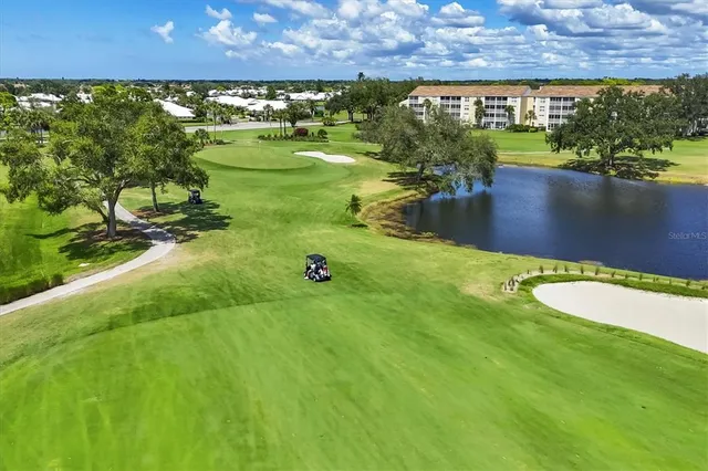 a terrace with outdoor seating and city view