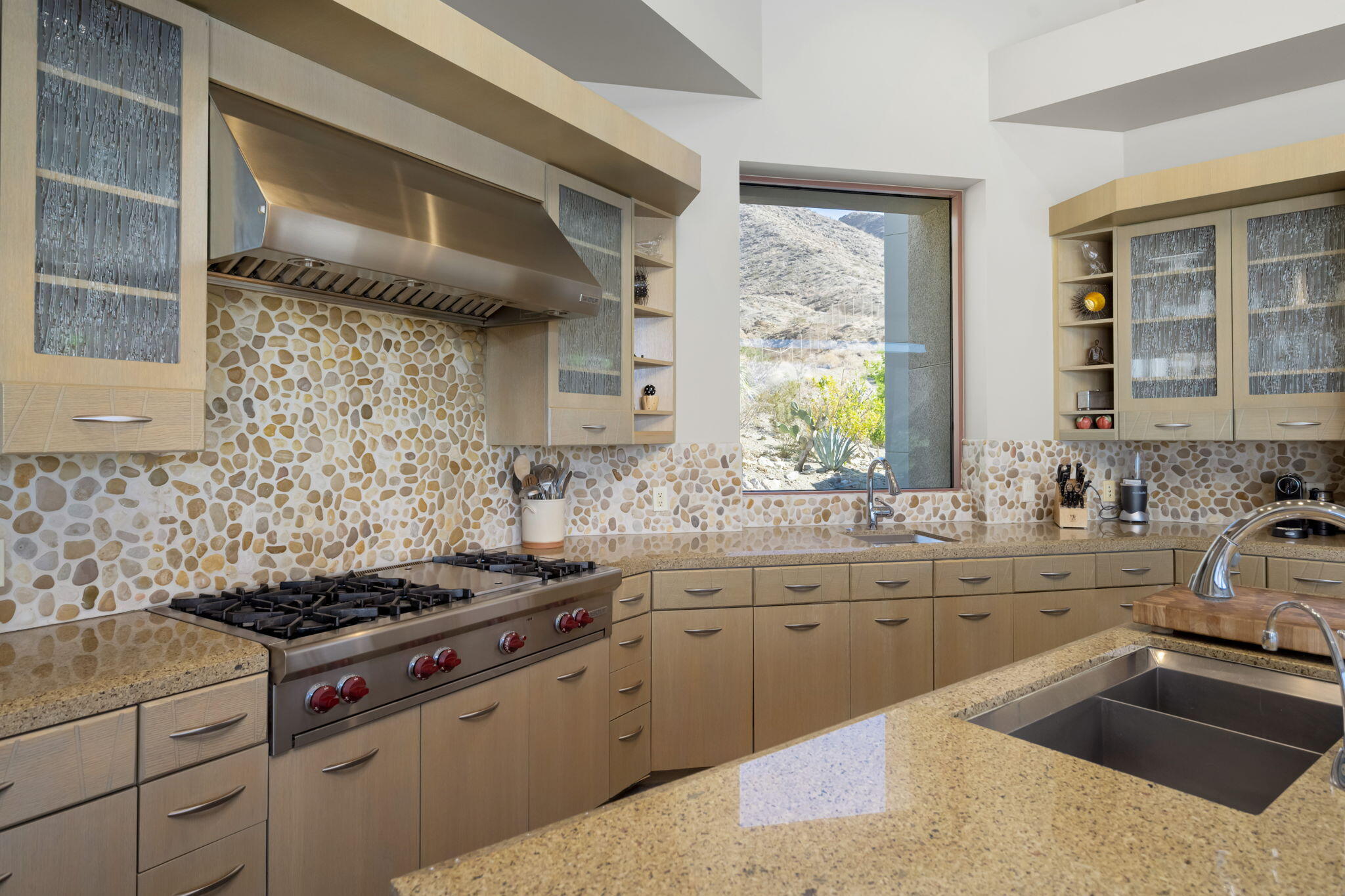 45 Sky Ridge Road Rancho Mirage, CA 92270 - Photo 11 of 85 a kitchen with a sink stove top oven and cabinets