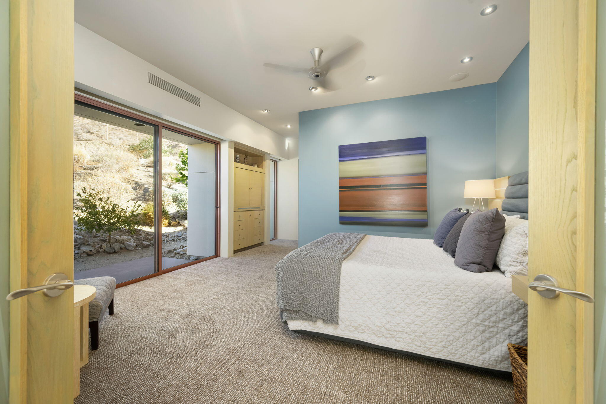 45 Sky Ridge Road Rancho Mirage, CA 92270 - Photo 27 of 85 a bedroom with a large bed and a large window