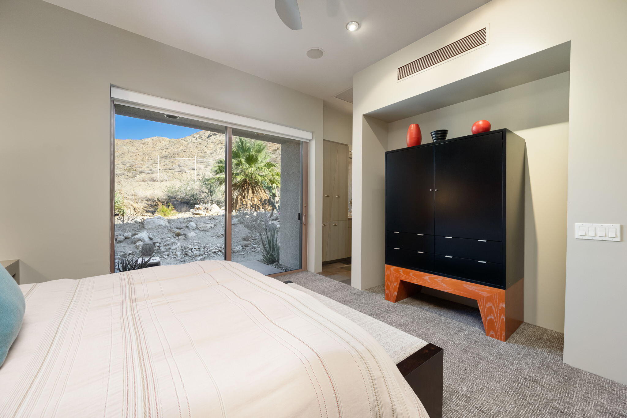 45 Sky Ridge Road Rancho Mirage, CA 92270 - Photo 28 of 85 a bedroom with a bed and a large window