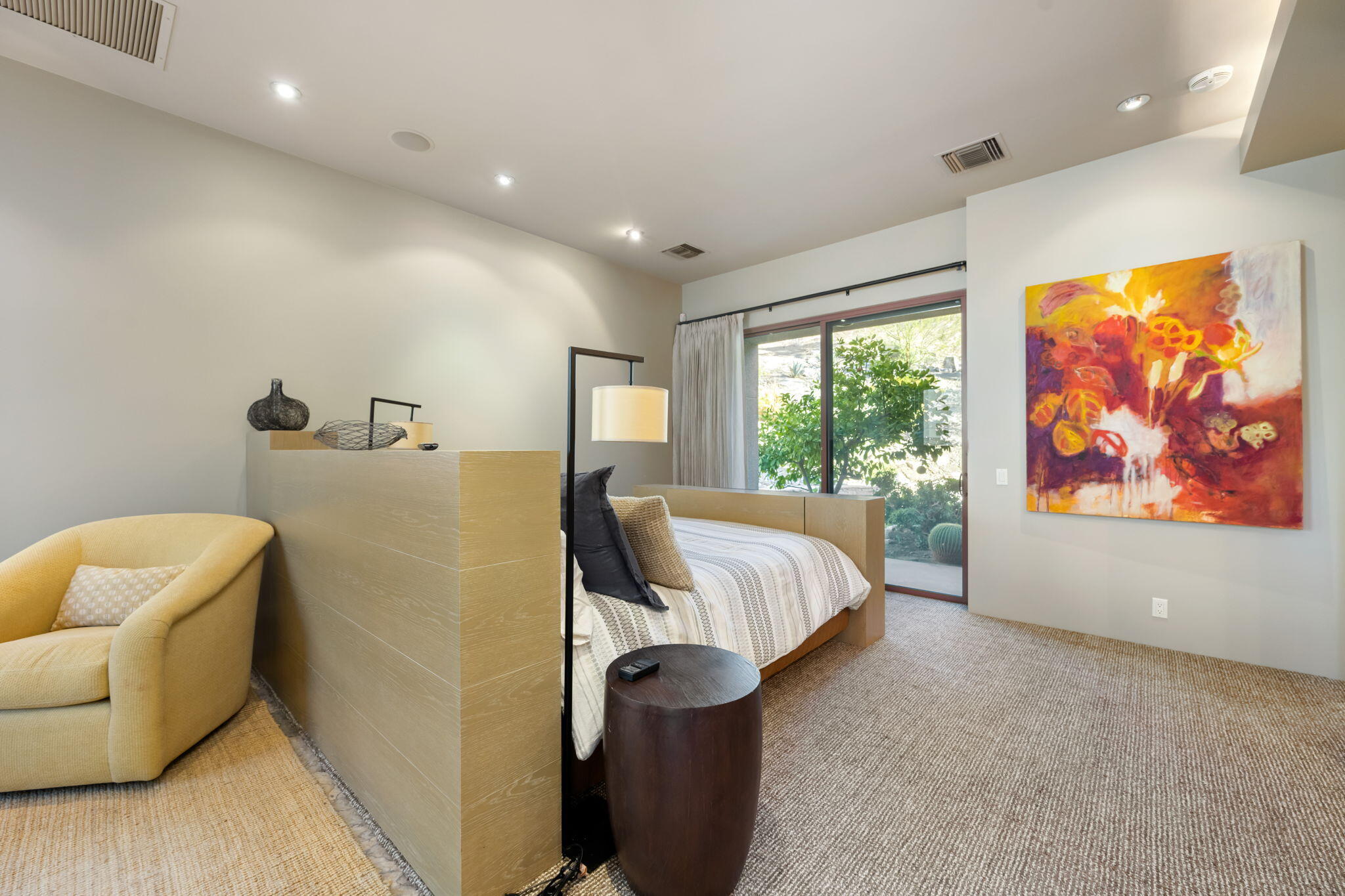 45 Sky Ridge Road Rancho Mirage, CA 92270 - Photo 32 of 85 a spacious bedroom with a bed and glass window