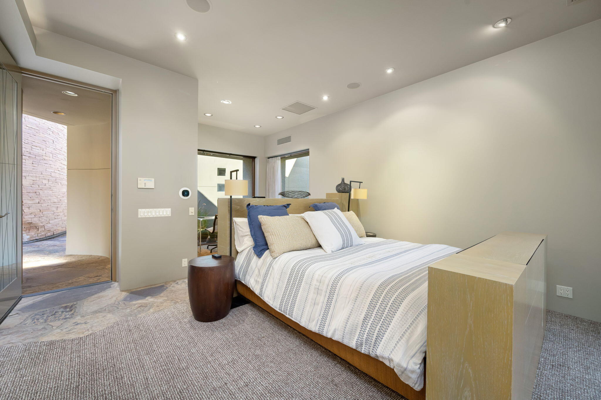 45 Sky Ridge Road Rancho Mirage, CA 92270 - Photo 33 of 85 a bed room with a bed and a lamp