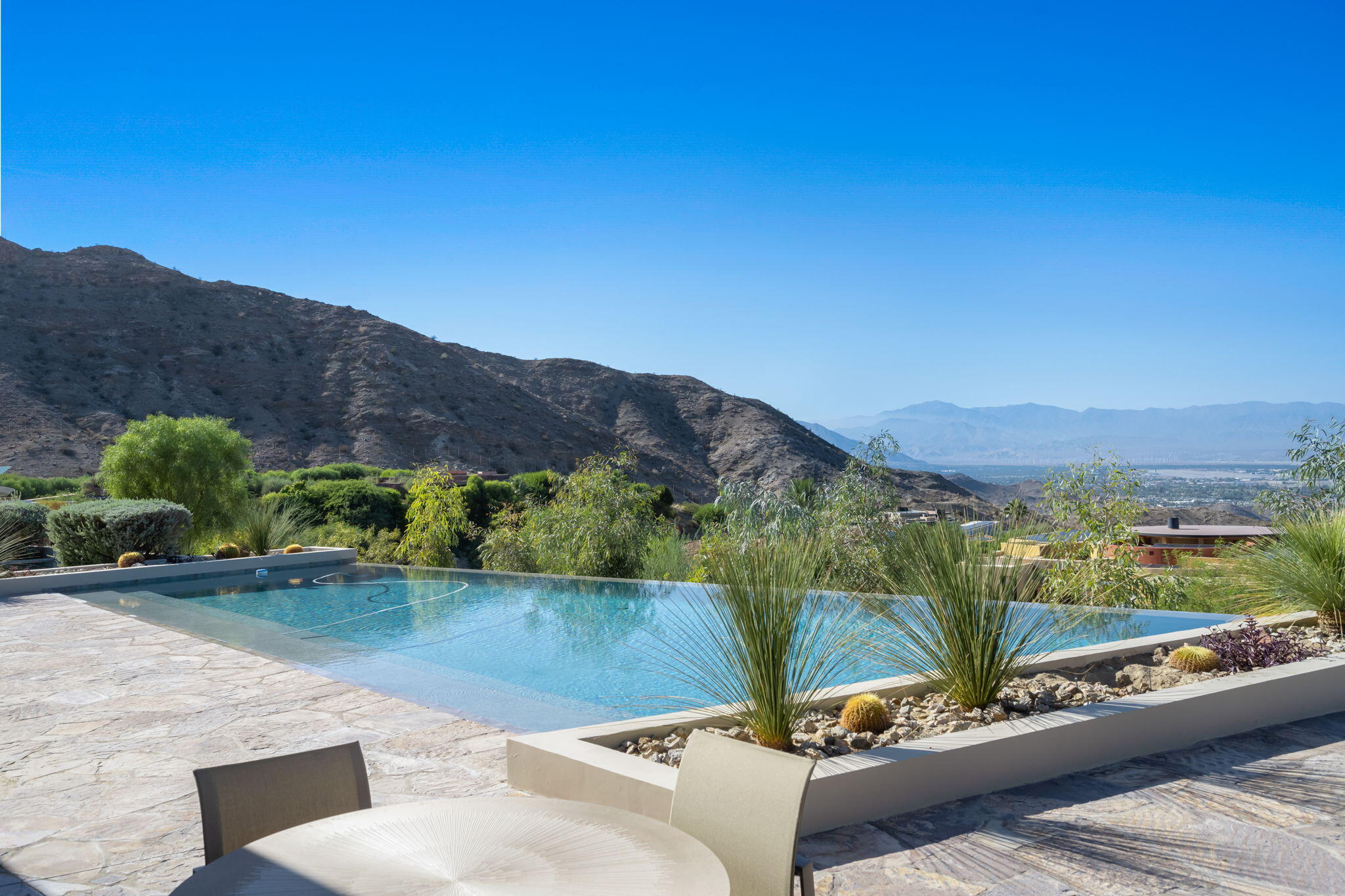 45 Sky Ridge Road Rancho Mirage, CA 92270 - Photo 58 of 85 a view of a terrace with a garden