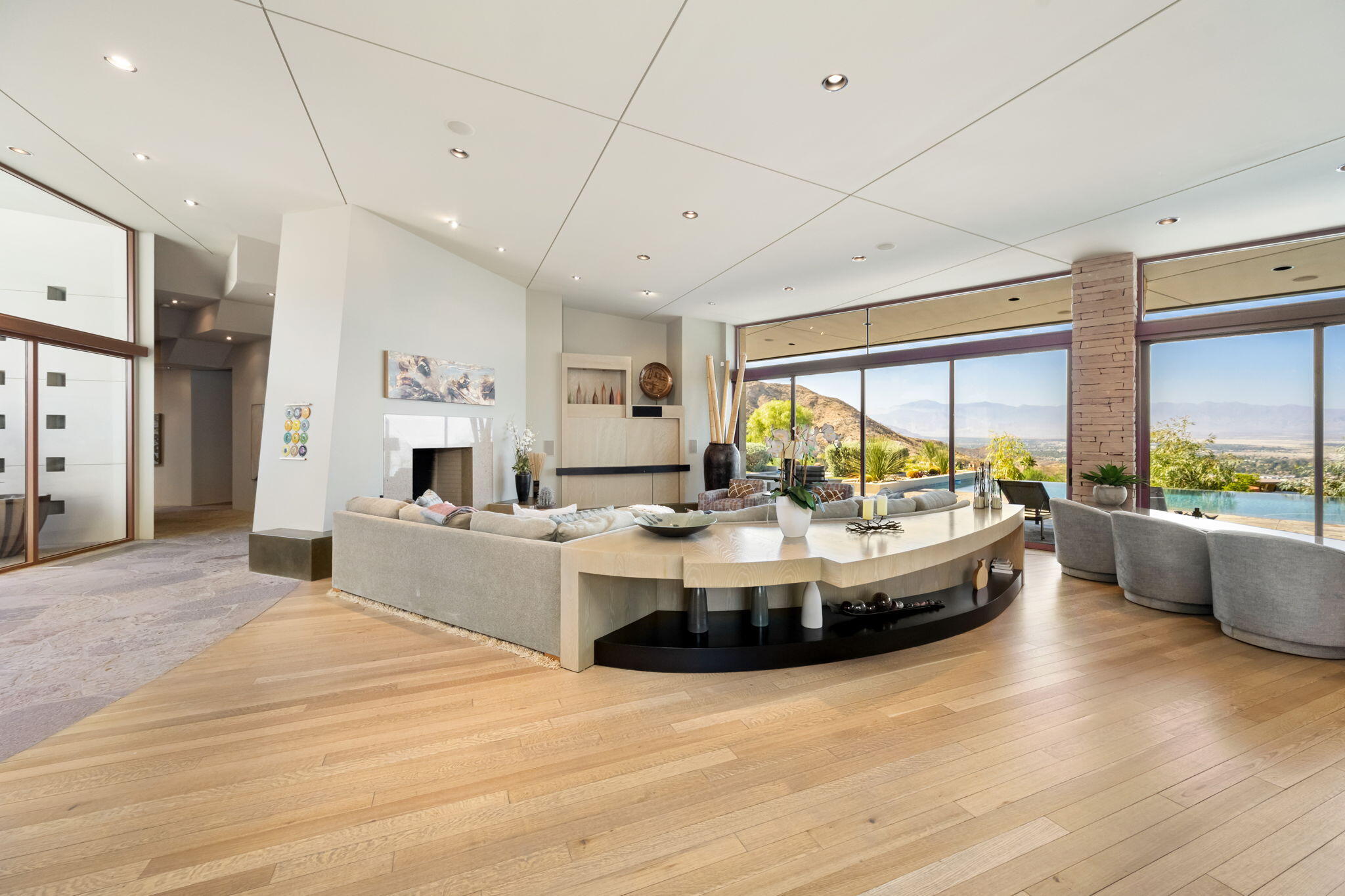 45 Sky Ridge Road Rancho Mirage, CA 92270 - Photo 69 of 85 a living room with kitchen island furniture and a large window