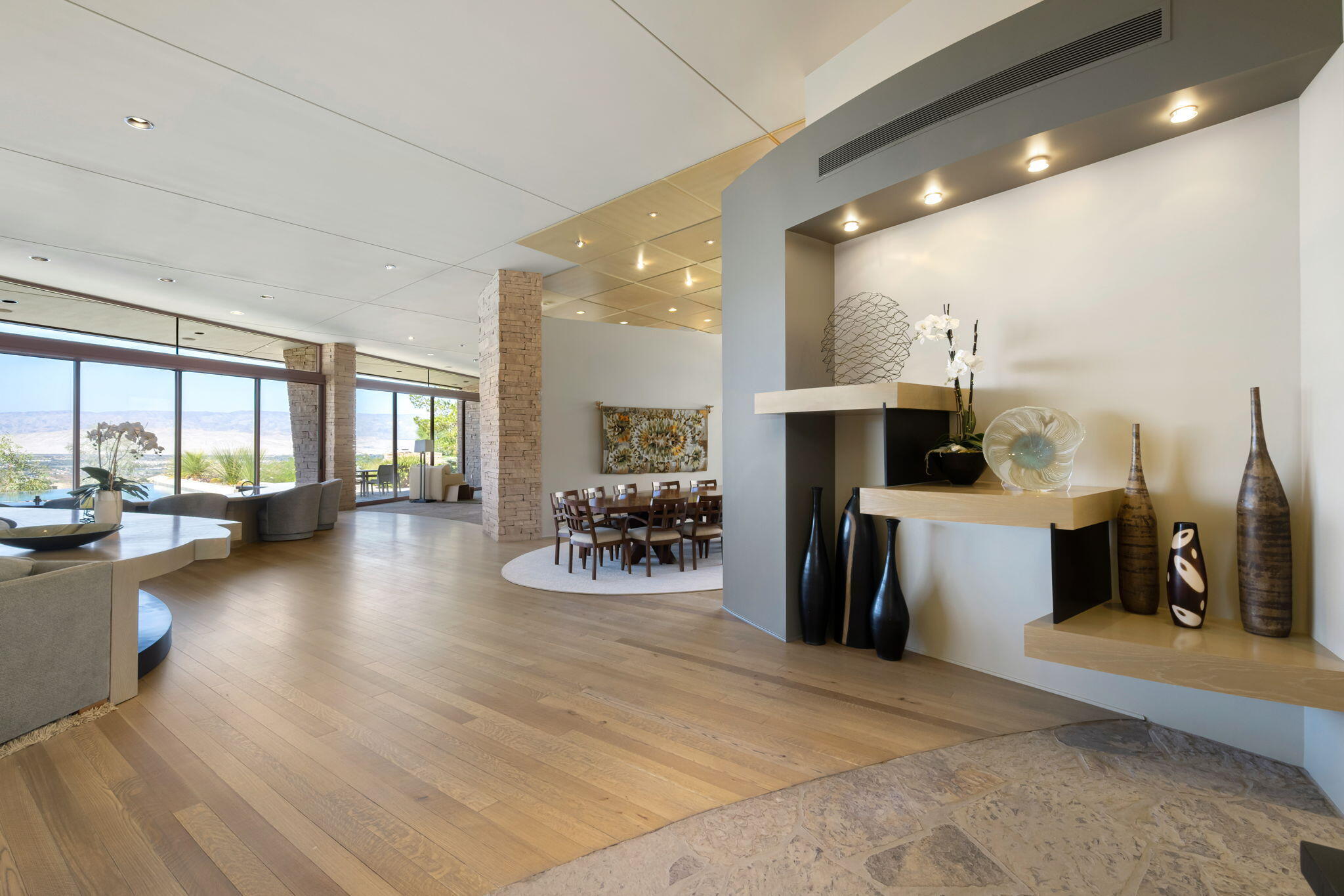 45 Sky Ridge Road Rancho Mirage, CA 92270 - Photo 74 of 85 a view of a living room and a livingroom with furniture wooden floor and windows