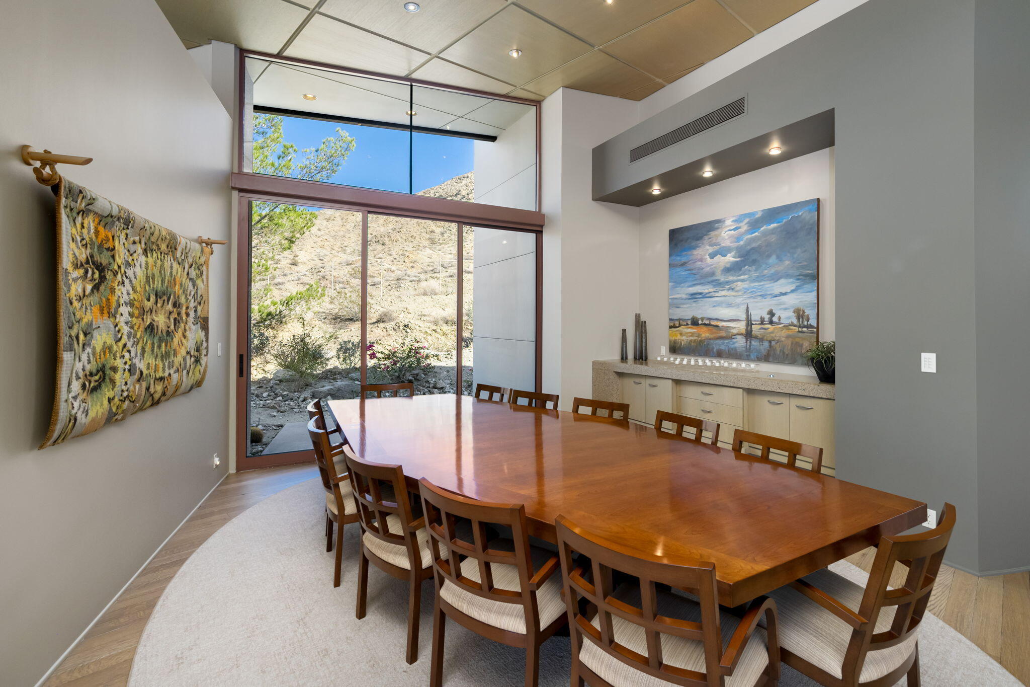 45 Sky Ridge Road Rancho Mirage, CA 92270 - Photo 75 of 85 a dining room with furniture a rug and wooden floor