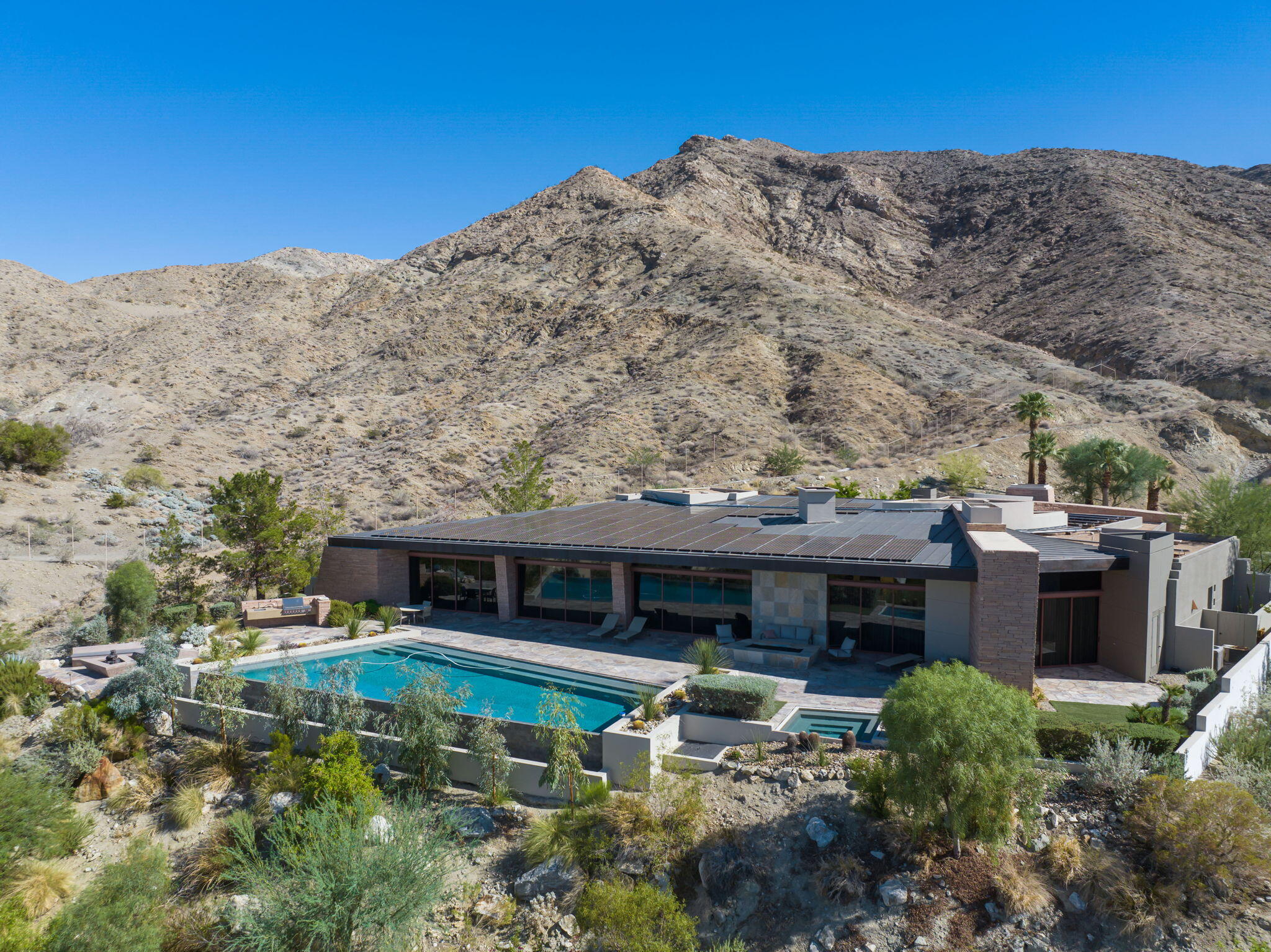 45 Sky Ridge Road Rancho Mirage, CA 92270 - Photo 83 of 85 a view of house with a yard and a large tree
