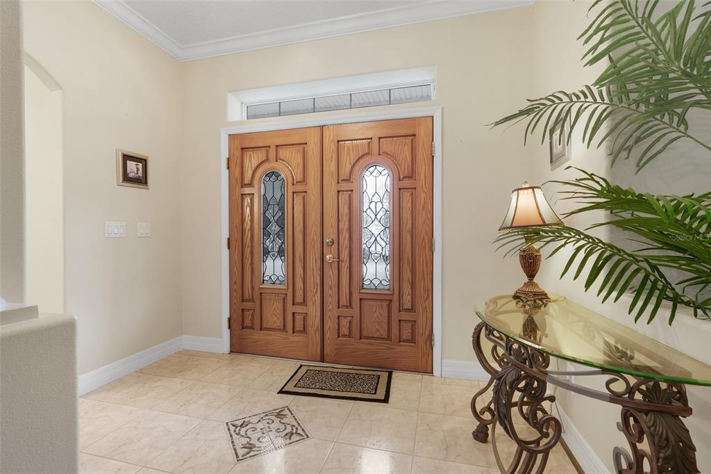 10336 Lake Louisa Road Clermont, FL 34711 - Photo 11 of 58 a view of a entryway with furniture and front door